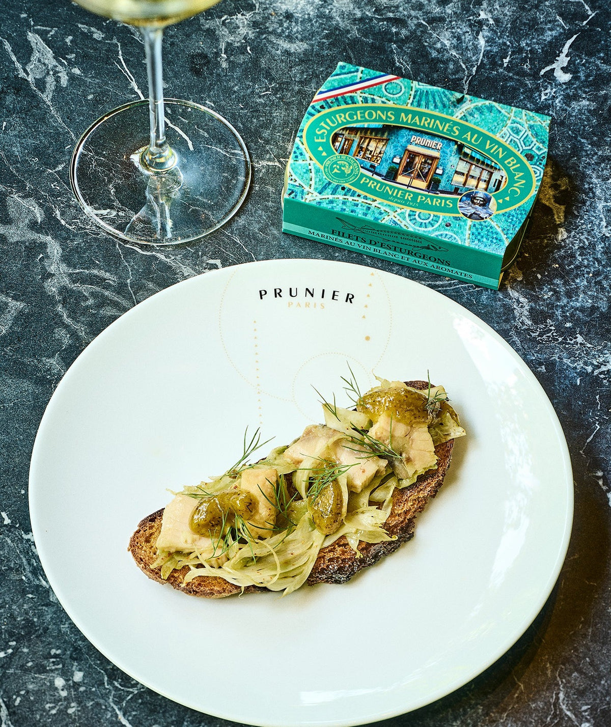 Sturgeon fillets marinated in white wine sauce